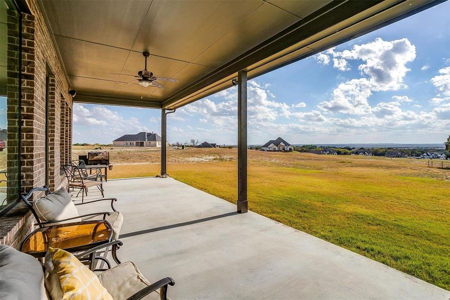 View of patio with ceiling fan