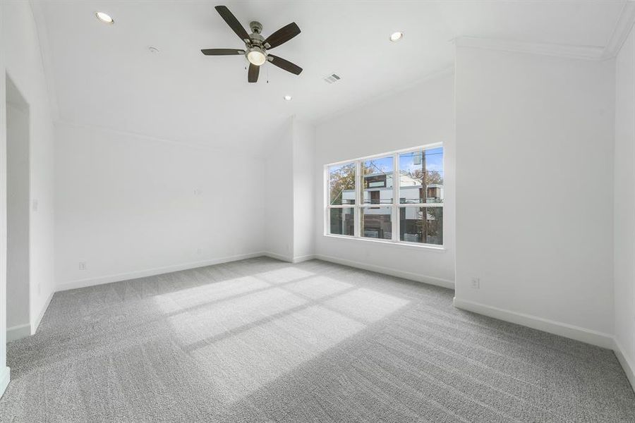 The Primary Bedroom, which features an abundance of light, and is extremely spacious. The bedroom comfortably fits a king-sized bed and still allows plenty of room to play with. (Sample photos of a completed Lisbon floor plan. The image may feature alternative selections and/or upgrades.)