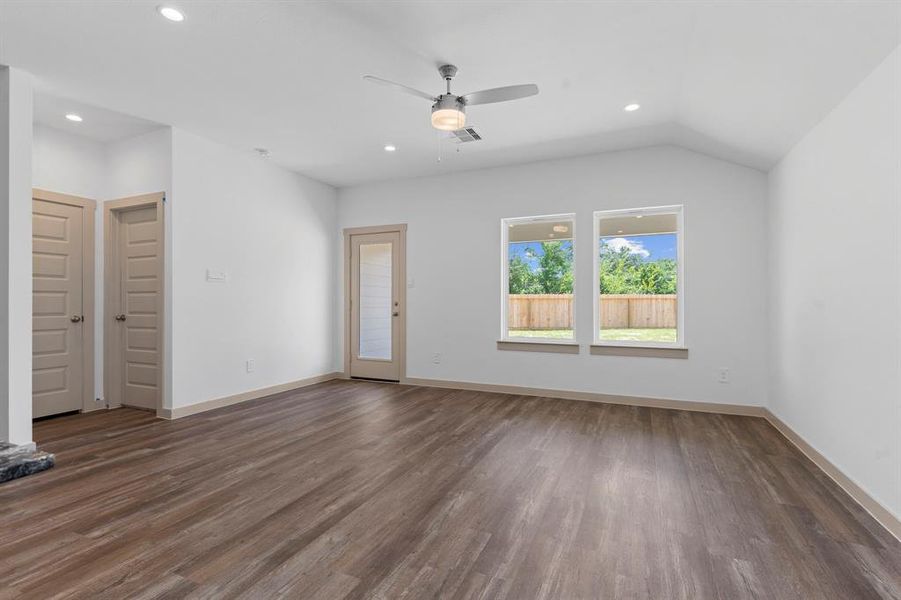Those Gorgeous Carefree Large Wood Vinyl Plank Floors flow into the hallway leading you to the Owner's Suite that is tucked away! **Image Representative of Plan Only and May Vary as Built**
