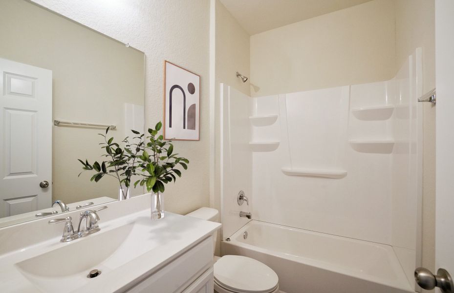 Upgraded secondary bath with elegant finishes