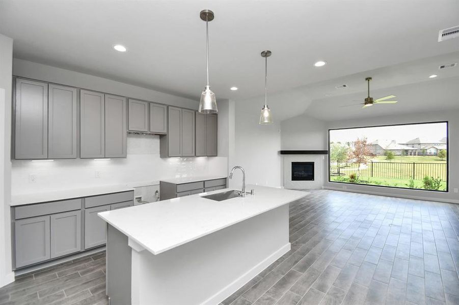 This generously spacious kitchen is a dream realized! Sample photo of completed home with similar floor plan. Actual colors and selections may vary.