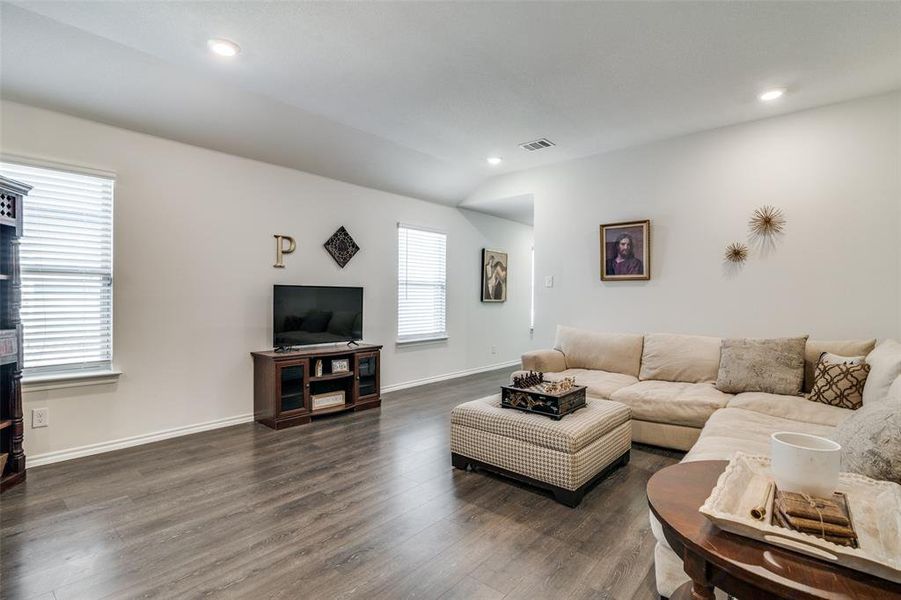 Living room featuring dark hardwood / wood-style floors