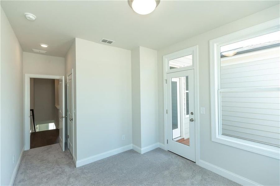 Secondary bedrooms with TONS of windows!