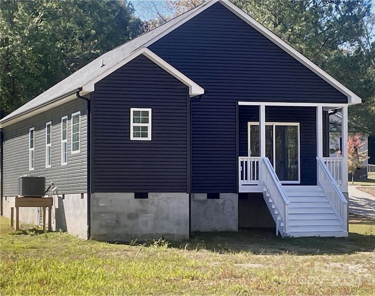 newly painted covered back porch