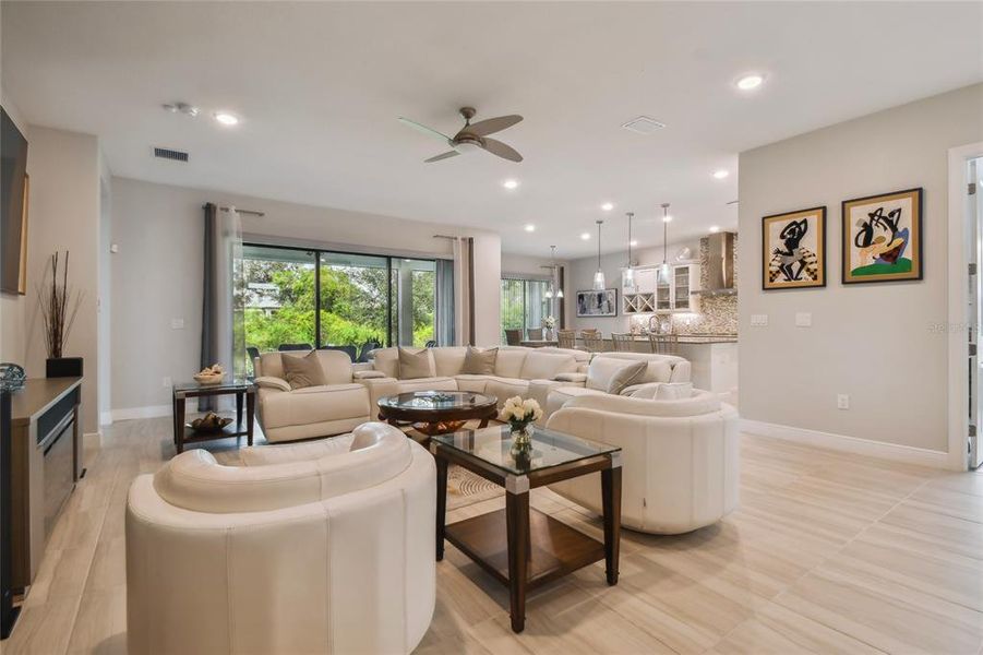 Currently used as a family room/dining room combination, this open floorplan is an extremely flexible / changeable living space.