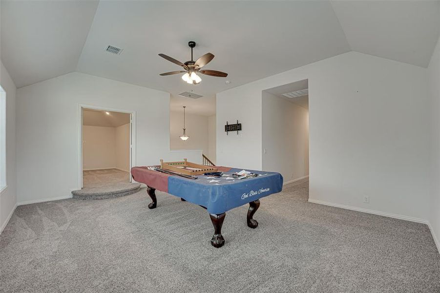 Playroom featuring carpet flooring, lofted ceiling, billiards, and ceiling fan