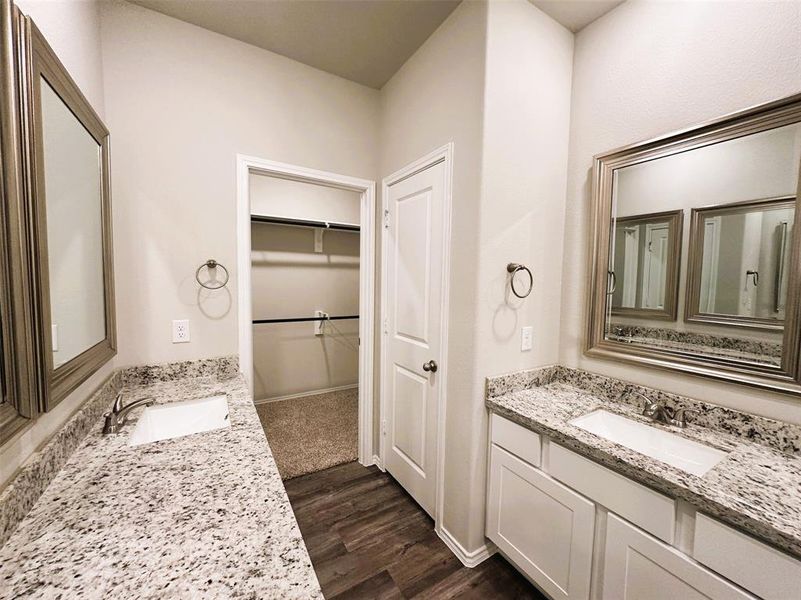 His sink & a linen closet for extra storage