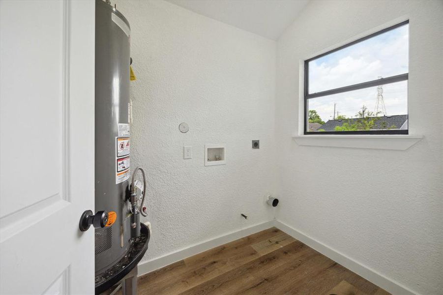 The utility room provides convenient access to your washer, dryer and extra household storage.