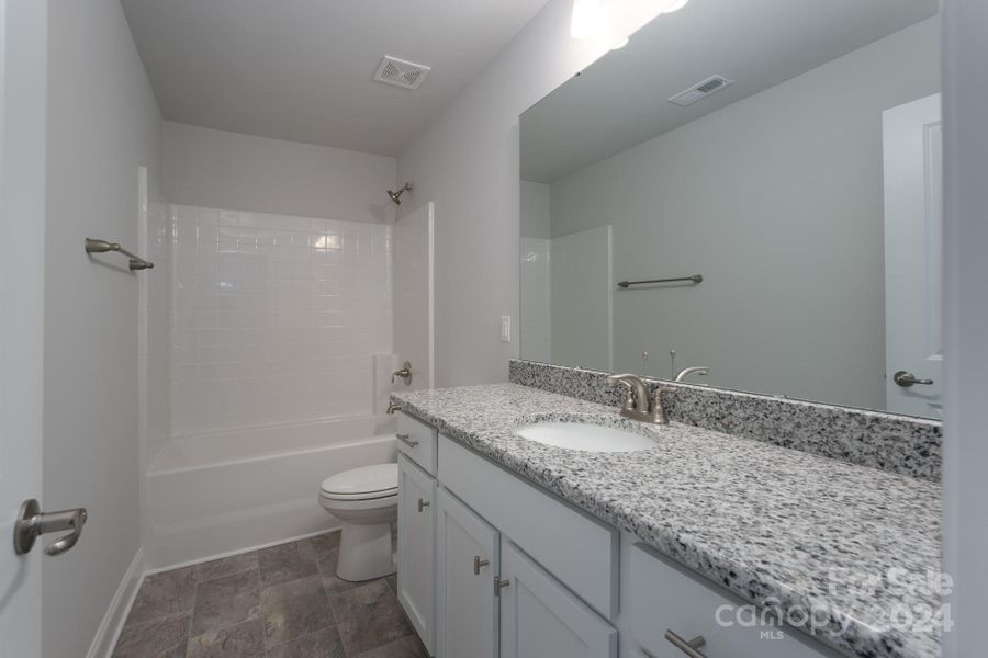 Upstairs Bathroom. Photo representation. Colors and options will differ.