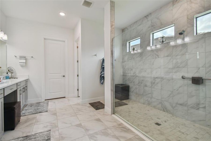 Primary bath with large walk-in shower