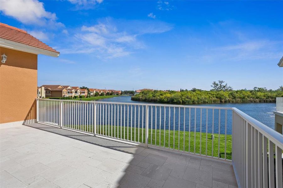 View of the lagoon and preserve from the Kitchen, Great Room, Dining Room and Main Bedroom.