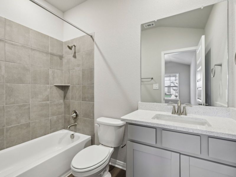 One of the secondary bedrooms has a full bathroom connected.