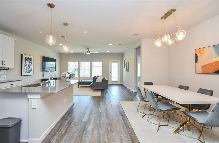 Living area with a view of the large open space leading to other rooms.