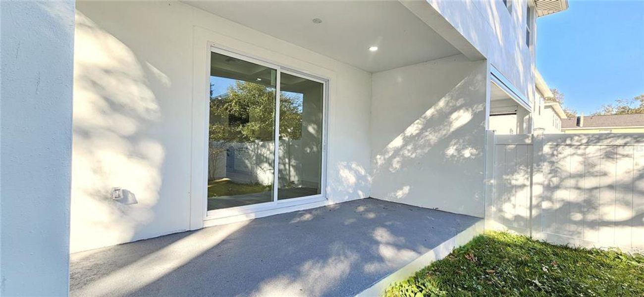 Back porch & fenced yard