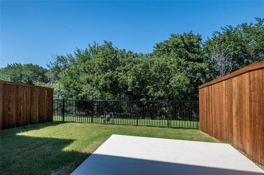 The icing on the cake of this dream home is your private, fenced back yard offering a fantastic view!