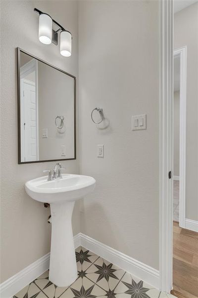 Bathroom featuring tile patterned floors