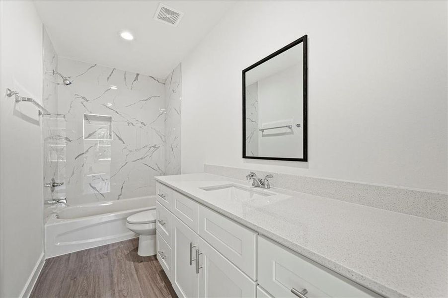 Get ready in style with the spacious bathroom counters, offering plenty of room for your personal care products.