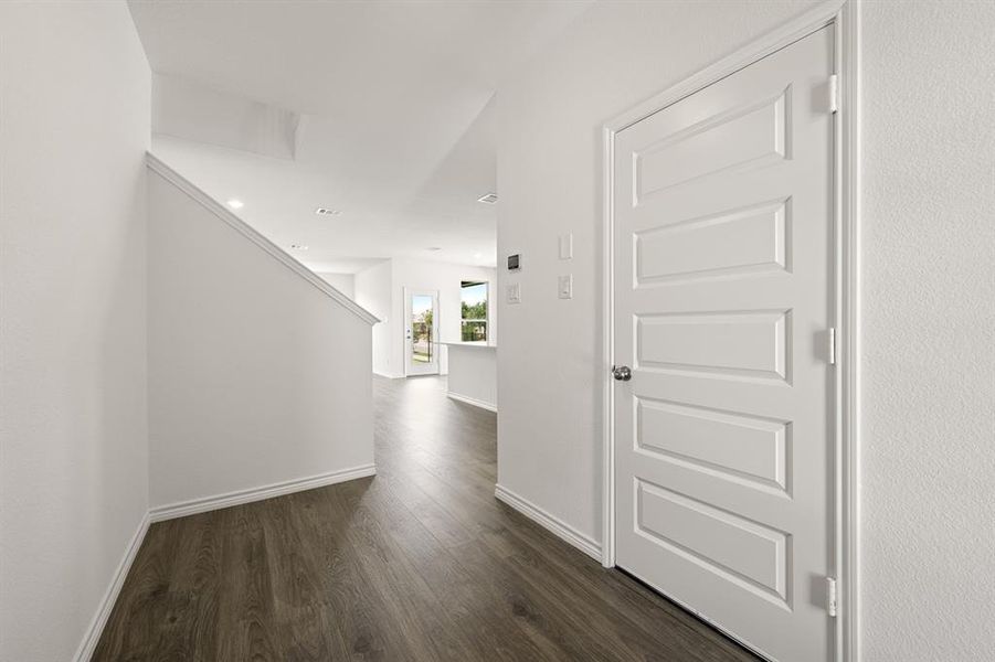 Hall featuring dark hardwood / wood-style floors