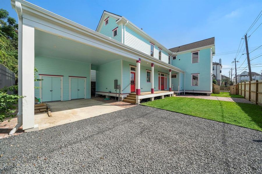 True-Grid paver system set into the parking area of the home – to allow for permeable surface and efficient drainage. 2-car carport with additional off-street parking within the property line for 2 more vehicles. EV charger installed