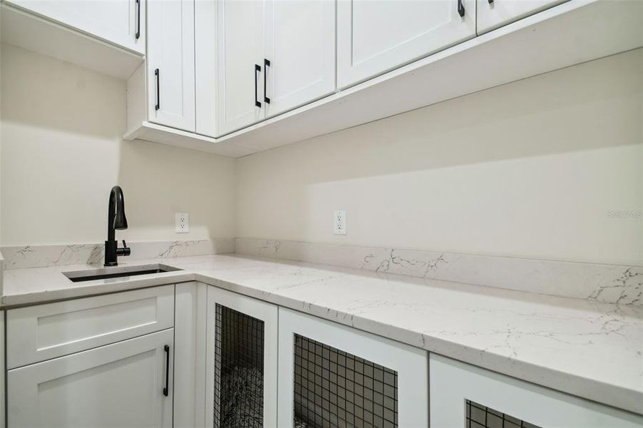 Extra storage/bonus room with sink. This could be a PET area or perfect for just extra storage!