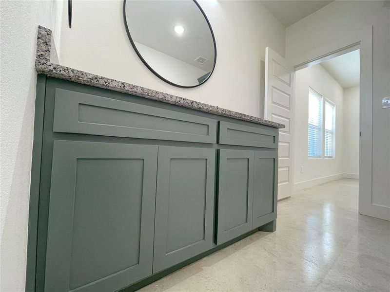 Bathroom featuring concrete flooring