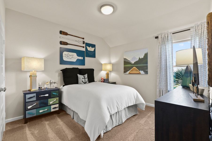 Bedroom in the Heisman home plan by Trophy Signature Homes – REPRESENTATIVE PHOTO