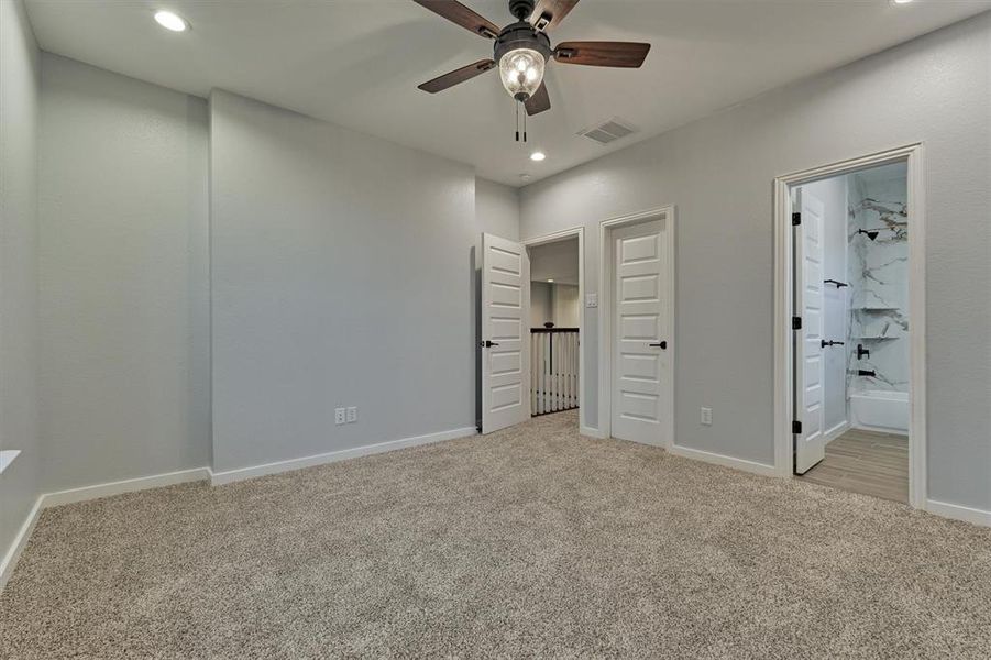 This room features a large walk in closet and ensuite bath.