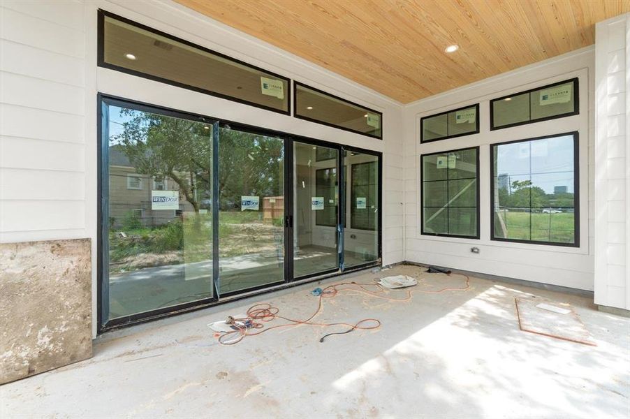 16 foot sliding doors separating the indoor and outdoor living area