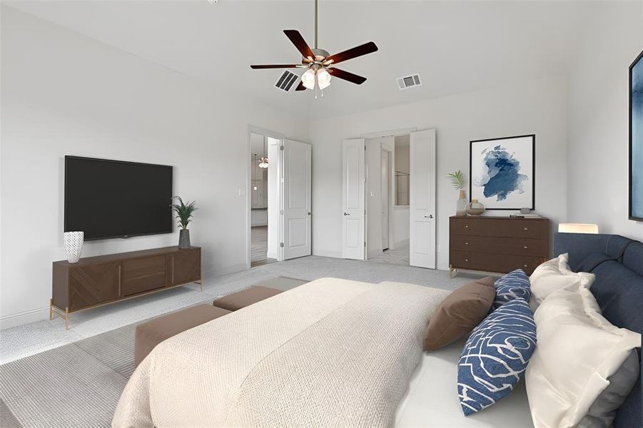 Carpeted bedroom featuring ceiling fan