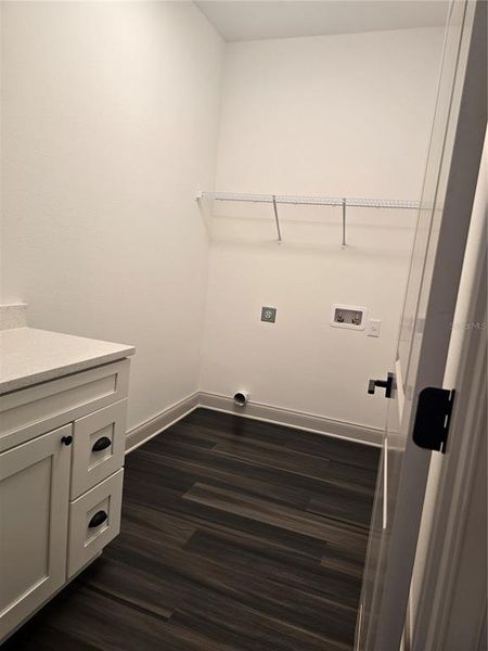 Indoor laundry room with counter space