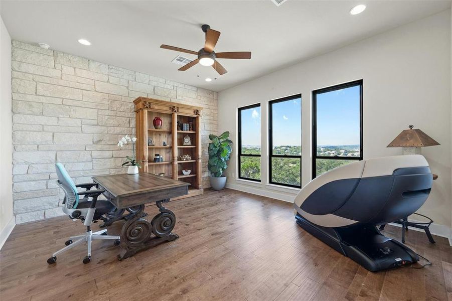 This is on the original floorplan as a game room, but owners are currently using it as an office.  Notice the gorgeous limestone wall detail.