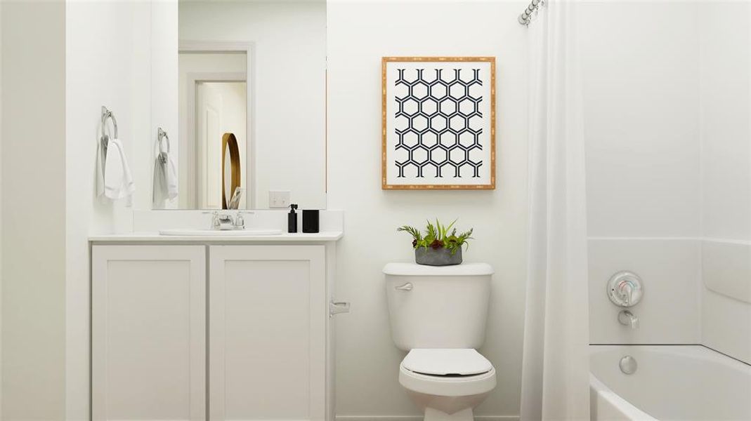 Bathroom with vanity and toilet