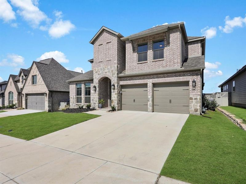 A two-story, open floor plan, with a 3-car garage.