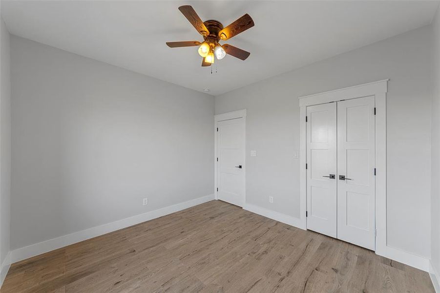 Bedroom 4 closet and entry door