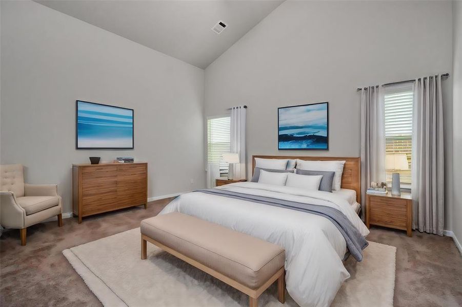 Another secondary bedroom shows off its spaciousness and the clean, modern aesthetic. The neutral palette and quality finishes make it easy to personalize this space to your taste. With direct access to a well-appointed ensuite bathroom, this bedroom is both functional and luxurious. **This image is from another Saratoga Home - Wren floorplan.**