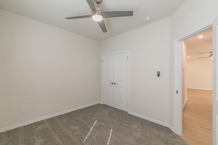 Unfurnished room with hardwood / wood-style flooring