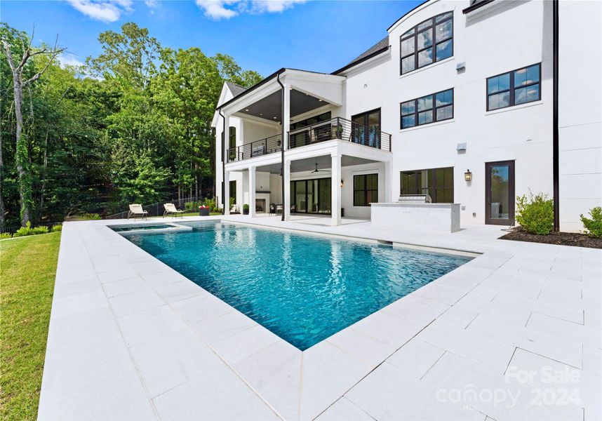 Pool with marble pool deck