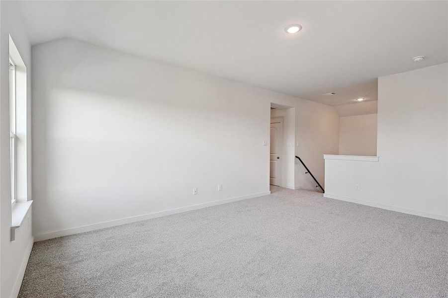 View of carpeted spare room