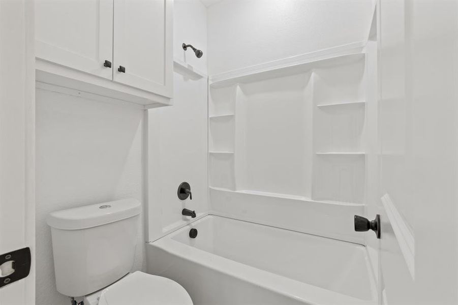 Bathroom with toilet and  shower combination