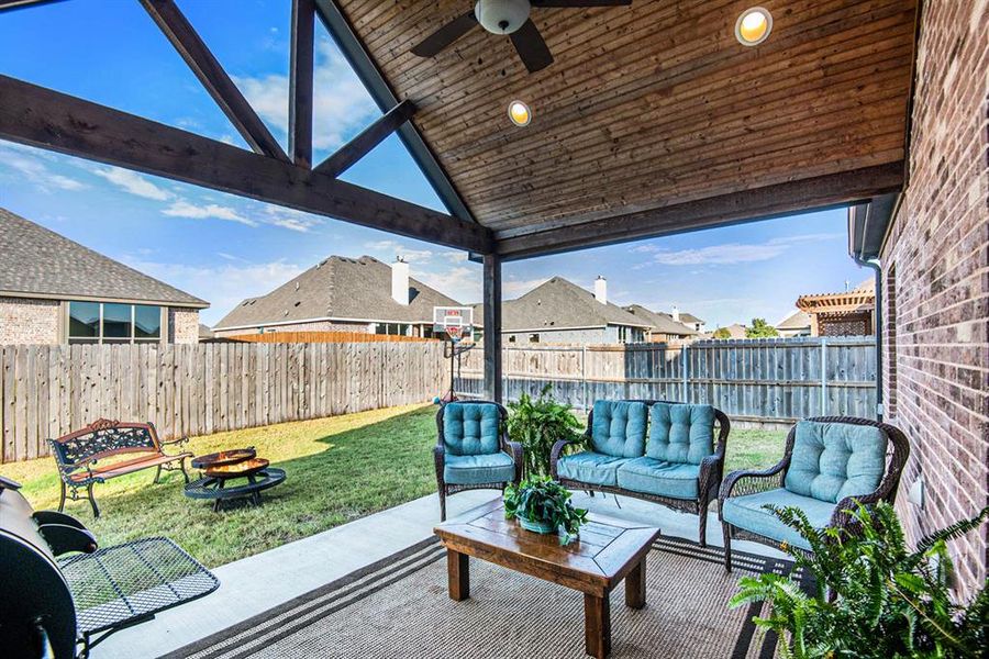 View of patio / terrace with a gazebo, an outdoor living space with a fire pit, and ceiling fan