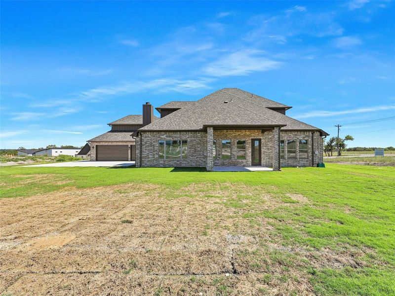 Step outside to a covered patio, perfect for enjoying the outdoors year-round