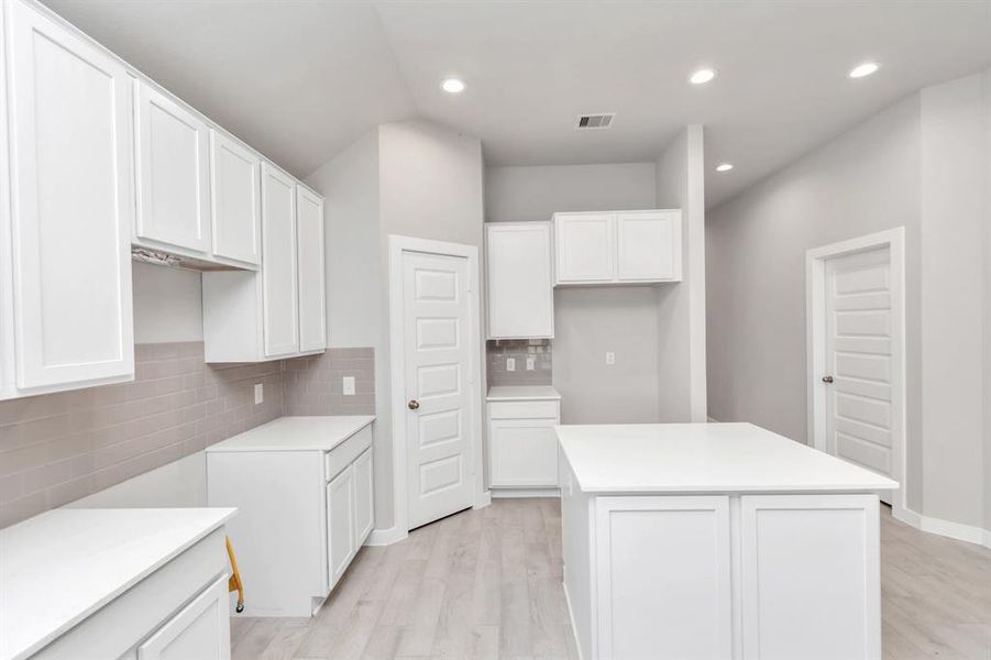 Step into the dream kitchen you've always wanted! Sample photo of completed home with similar floor plan. As-built interior colors and selections may vary.