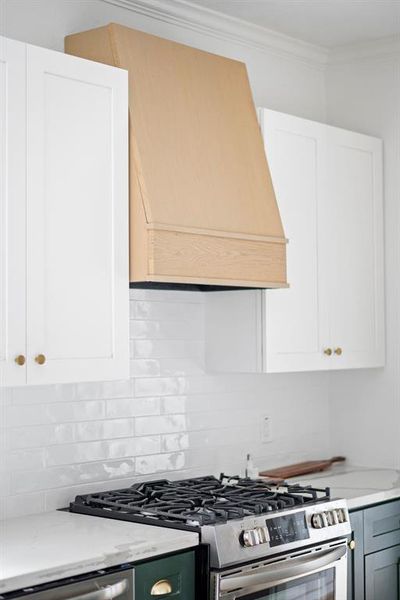 Custom white oak range hood built on site.