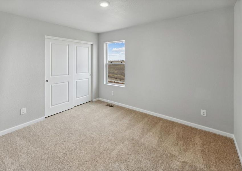 The third bedroom in the Yale floor plan is as a child's room or as an office space.