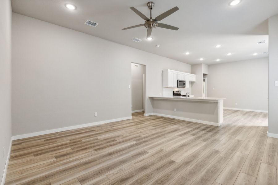 Living Room in the Pecan home plan by Trophy Signature Homes – REPRESENTATIVE PHOTO