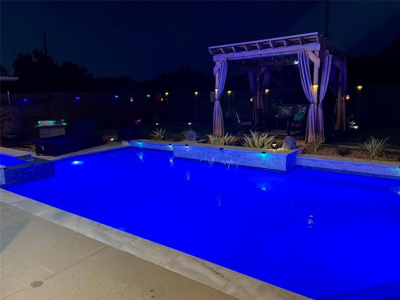 Pool lighting at night.