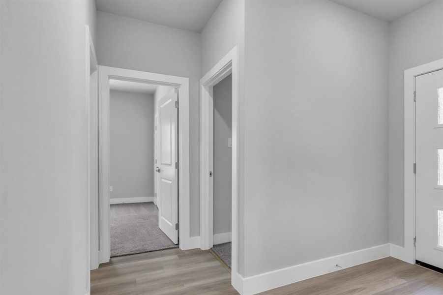 Foyer entrance featuring light wood-type flooring