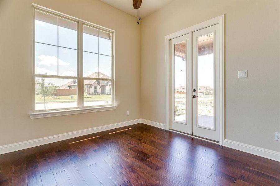 Entryway featuring french doors and dark hardwood / wood-style floors