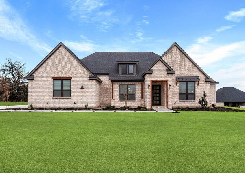 The Bradley II is a beautiful, one-story brick home with wood accents.