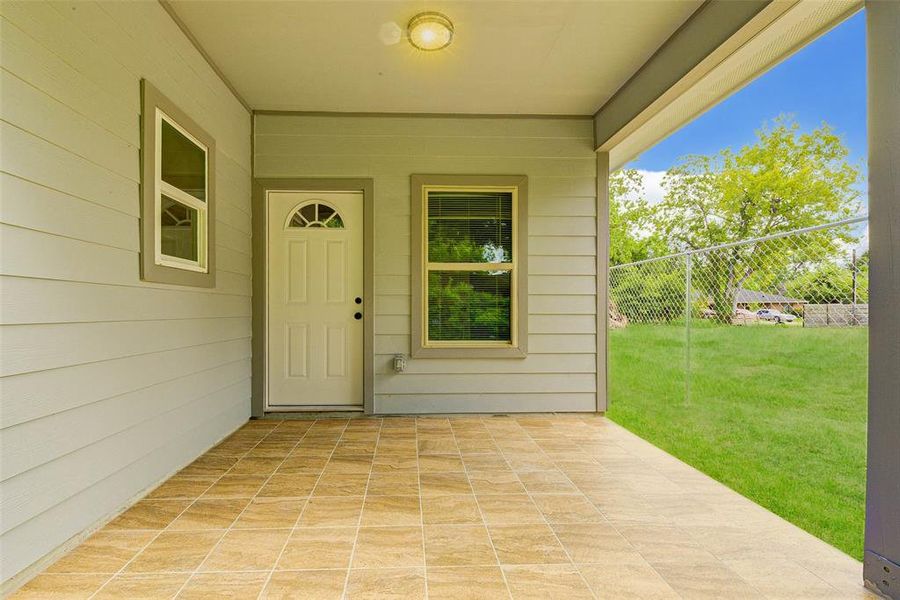 Covered patio with flooring!